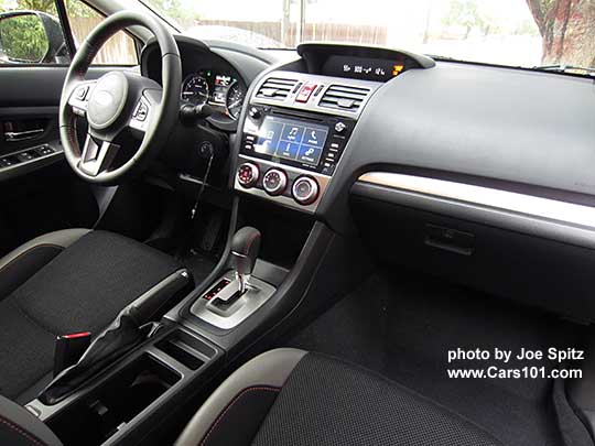2016 Subaru Crosstrek Premium CVT with silver dash trim and shift surround, black cloth with orange stitching