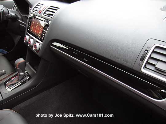 2016 Subaru Crosstrek Limited gloss black dash trim and shift surround.  Passenger side shown.
