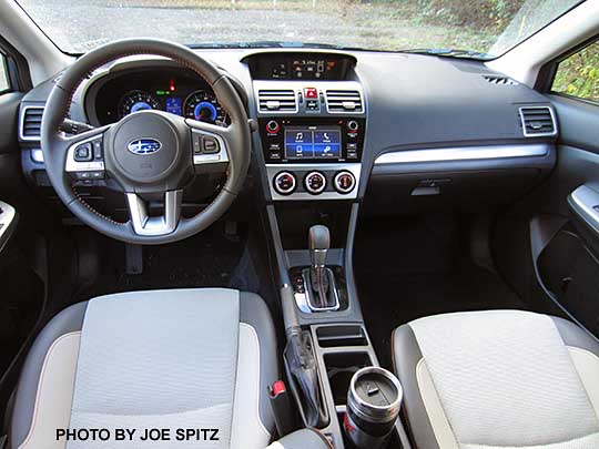 2016 Subaru Crosstrek Hybrid ivory cloth interior. Notice the blue gauges