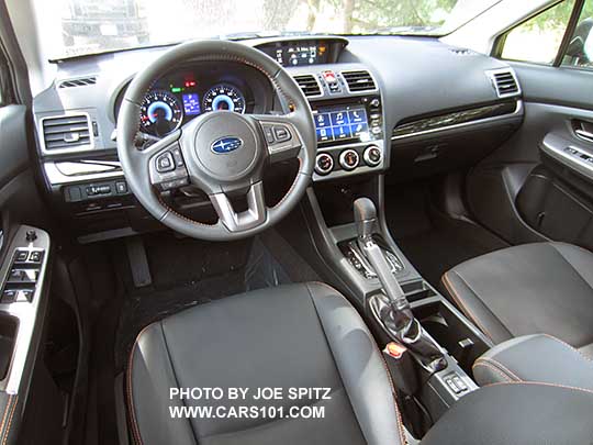 2016 Subaru Crosstrek Hybrid Touring interior- black leather, orange stitching, 7" audio, gloss black dash and shifter trim