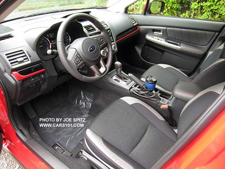 2016 Subaru Crosstrek Special Edition has red and black dash trim, black cloth with red stitching