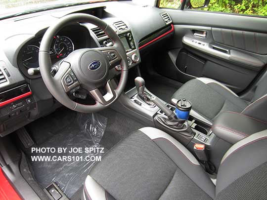 interior of the 2016 Crosstrek Premium Special Edition red and gloss black dash trim