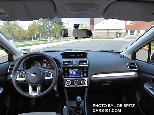 interior view 2016 Crosstrek Premium, silver dash trim, manual transmission shown.