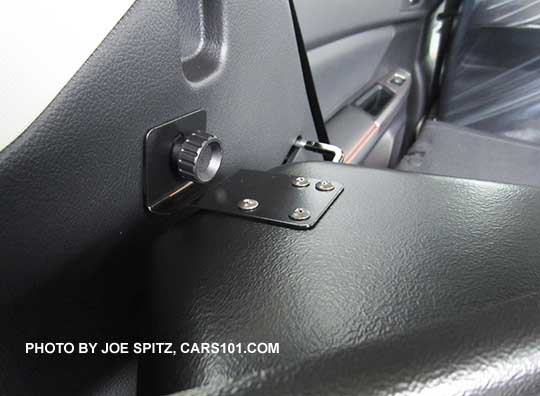 2016 Subaru Crosstrek optional Kicker subwoofer is held in place with thumb screws and brackets