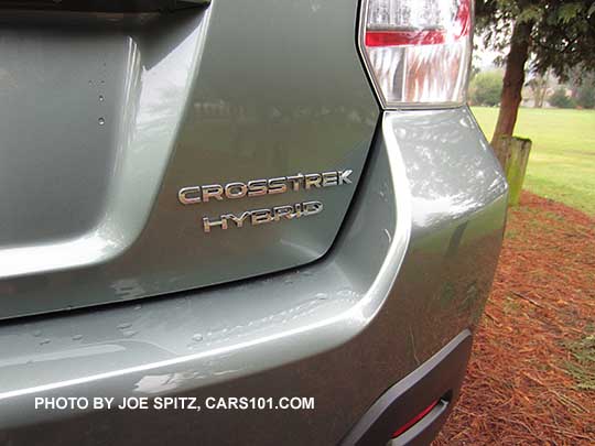 2016 Subaru Crosstrek Hybrid rear tailgate logo. Jasmine green color shown
