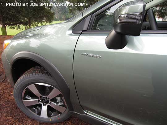 2016 Subaru Crosstrek Hybrid front fender logo. Jasmine green color shown