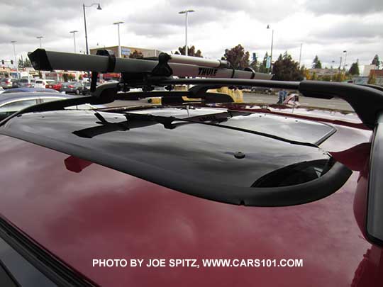 2016 Subaru Crosstrek with optional dealer installed moonroof air deflector and bike carrier