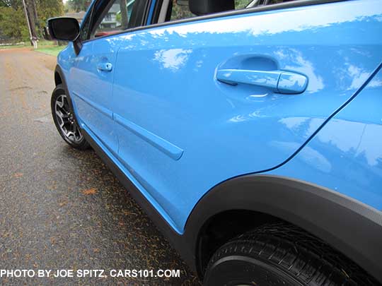 2016 Subaru Crosstrek optional body side moldings, body colored,  hyperblue color shown.