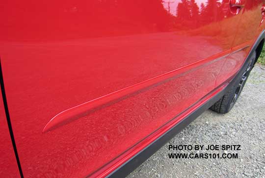 optional body side moldings on a pure red 2016 Crosstrek Special Edition.