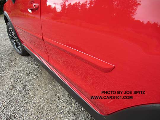 optional body colored side moldings on optional body side moldings on the pure red 2016 Subaru Crosstrek Premium Special Edition.