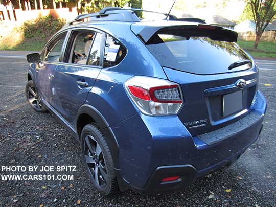 rear side view 2016 Quartz Blue Subaru Crosstrek Hybrid, wioth optional rear bumper cover