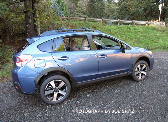 side view 2016 Quartz Blue Subaru Crosstrek Hybrid with optional cross bar