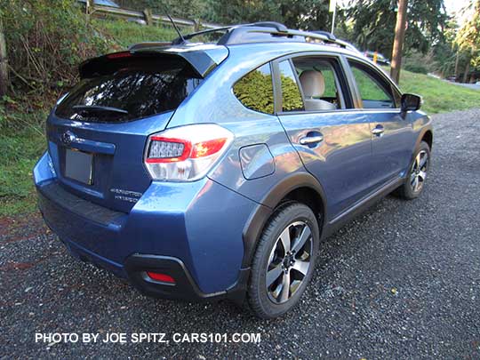 side and rear view 2016 Quartz Blue Subaru Crosstrek Hybrid with optional cross bar