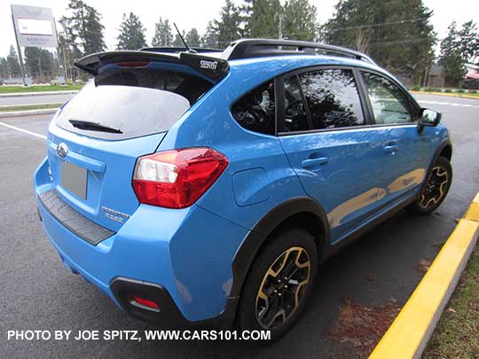2016 hyperblue color Subaru Crosstrek with optional black STI rear spoiler