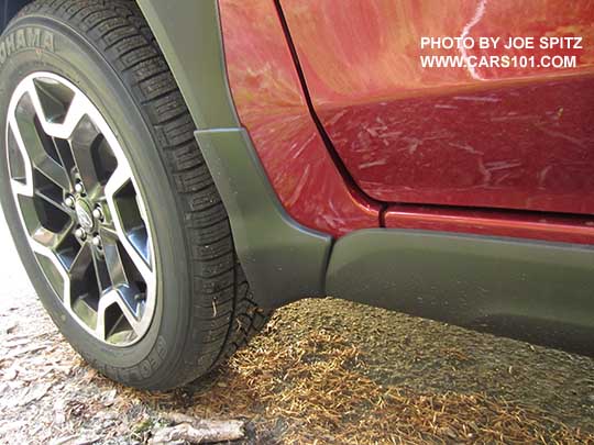 2016 Subaru Crosstrek left front splash guard, venetian red car shown