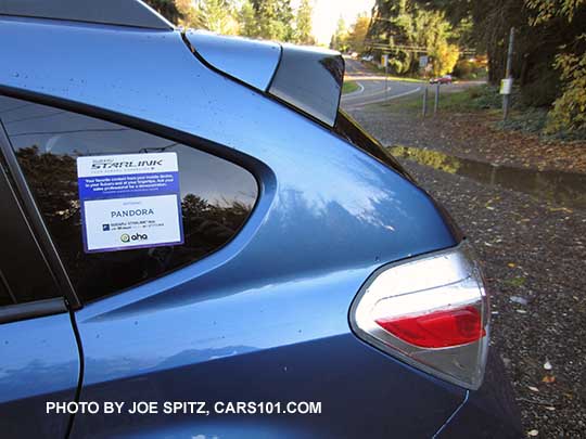 2016 Crosstrek Hybrid rear spoiler with black trailing edge. Ice silver shown.