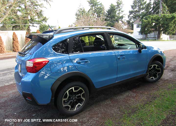 2016 Crosstrek 2.0 with the optional STI black rear spoiler with STI logo, Hyperblue car shown.