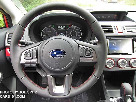 2016 Subaru Crosstrek Premium Special Edition steering wheel- leather wrapped, red stitching. Red dash trim in the background.