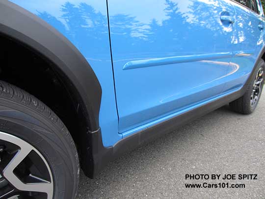 2017 Subaru Crosstrek optional body side moldings, body colored, shown on a hyperblue car.