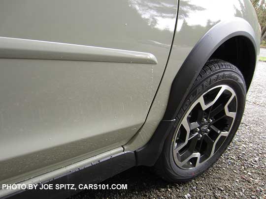closeup of a 2017 khaki  colored Subaru Crosstrek optional khaki colored body side moldings
