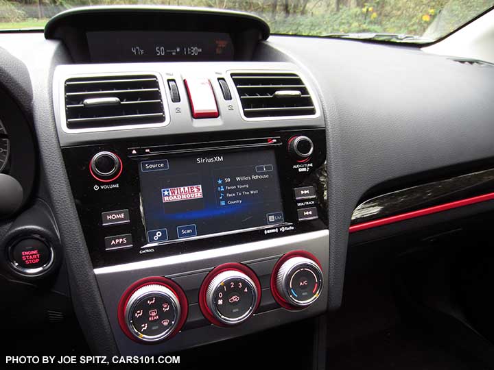 2017 Crosstrek Premium Special Edition pushbutton start,   6.2" audio screen with gloss black trim, and red ringed manual heater/ac controls with 4 speed fan, upper console trip computer, and red/black dash trim