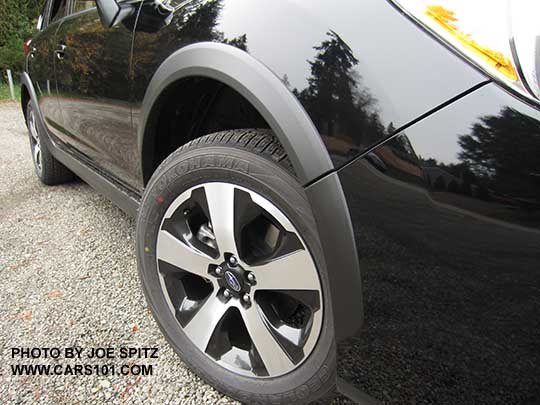 closeup of the wheel arch molding on all Subaru Crosstreks.  Premium Special Edition, crystal black color shown