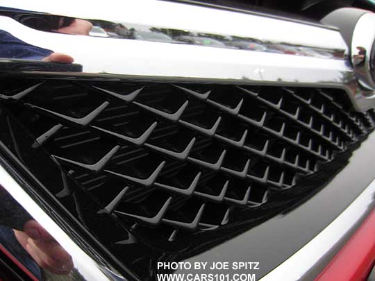 closeup of the gloss black frame on the 2017 Crosstrek Premium Special Edition front grill
