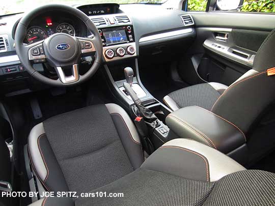2017 Subaru Crosstrek Premium gray cloth seats, silver dash trim and CVT shift surround, leather wrapped steering wheel