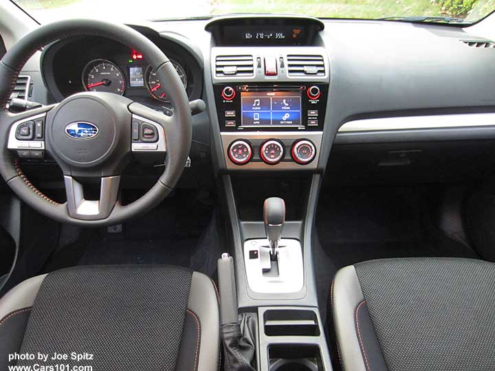 2017 Subaru Crosstrek Premium cloth interior- gray with silver bolters, orange stitching, silver dash trim and shift surround. leather wrapped steering wheel, 6.2" audio system.