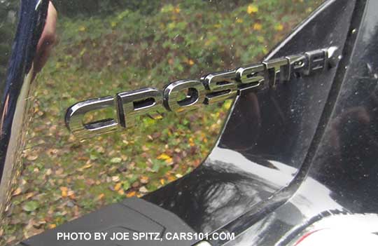 2017 Crosstrek Premium Special Edition black rear logo, shown on the Crystal black car