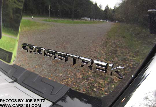 2017 Crosstrek Premium Special Edition black rear logo, shown on the Crystal black car