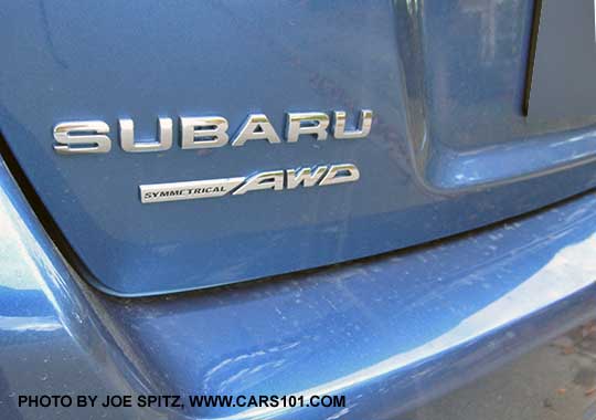 2017 Crosstrek left side silver rear Crosstrek and symmetrical AWD logo, quartz blue car shown