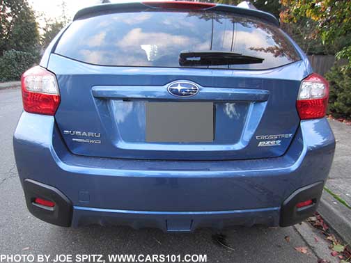 2017 Quartz Blue Subaru Crosstrek rear view. Shown without the optional rear bumper protector