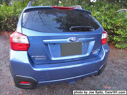 2017 Quartz Blue Subaru Crosstrek rear view. Shown without the optional rear bumper protector