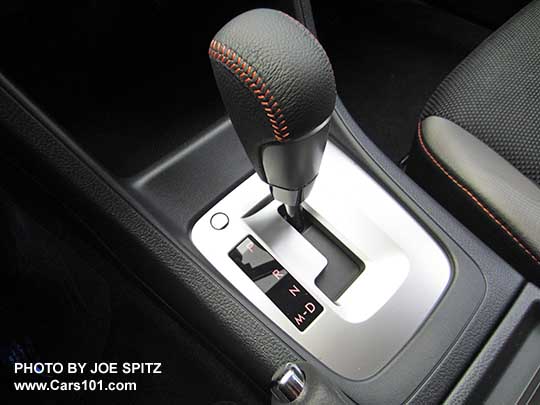 2017 Crosstrek Premium leather wrapped CVT shift knob with orange stitching, and silver shift plate