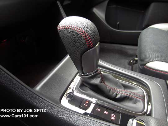 2017 Crosstrek Premium Special Edition leather wrapped CVT shift knob with red stitching, and gloss back shift plate.