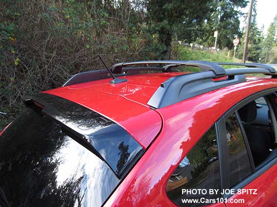 2017 Crosstrek Premium Special Edition rear spoiler with trailing rear edge and indented brake light is slightly larger than other Crosstreks. Pure red shown