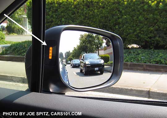 2018 Subaru Crosstrek blind spot detection symbol displays in the outside mirror housing. See white arrow.