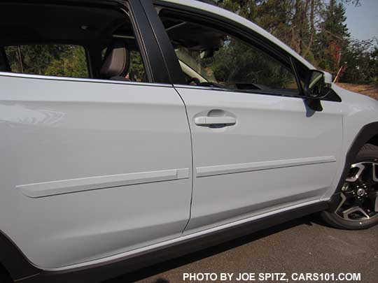 2018 Subaru Crosstrek optional body side moldings, body colored, on a cool gray khaki color car