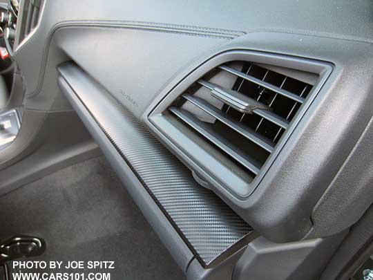 closeup of the 2018 Subaru Crosstrek 2.0i and Premium dash with dark gray carbon fiber patterned plastic trim, molded gray 'stitched' dash trim, gray vent trim