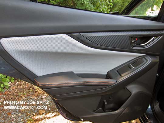 2018 Subaru Crosstrek rear door panel, Limited with gray perforated leatherette insert, orange thread stitching
