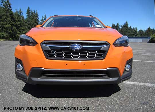 2018 Subaru Crosstrek Limited front grill and fog lights, Sunshine orange car shown