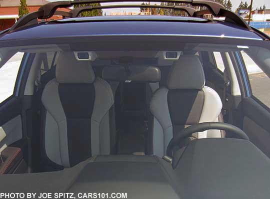 2018 Subaru Crosstrek Limited with Eyesight cameras by the rear view mirror.  dark and light gray leather interior