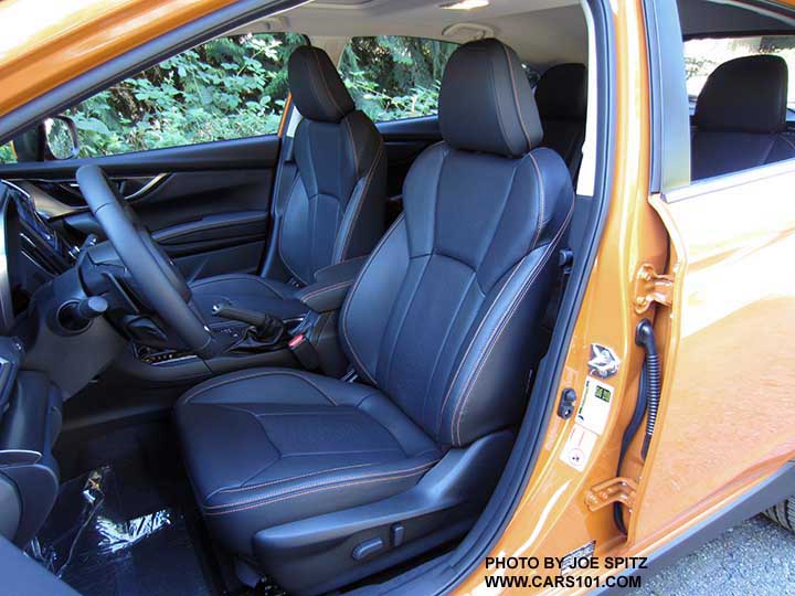 2018 Subaru Crosstrek Limited, power driver's seat, black leather interior with orange stitching. Sunshine orange car shown.
