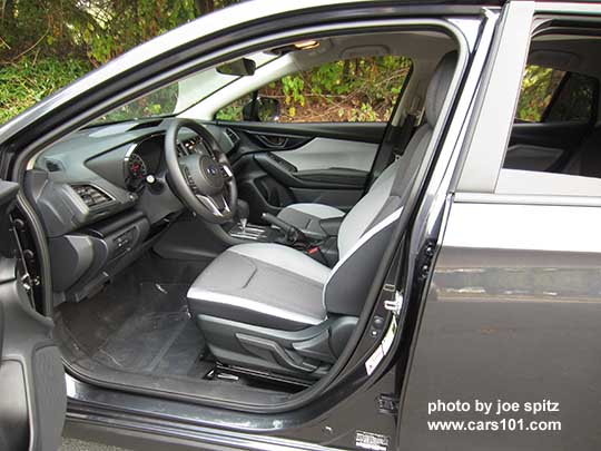 2018 Subaru Crosstrek 2.0i (base model) CVT, light and dark gray cloth,  black stitching, vinyl covered steering wheel