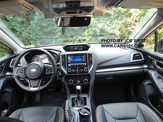 2018 Subaru Crosstrek Limited with black leather, gloss black shift trim, silver dash trim. Shown with optional eyesight cameras by the rear view mirror