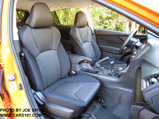 2018 Subaru Crosstrek 2.0i (base model) interior with manual 6speed transmission, gray cloth, black stitching, no heated seat buttons.