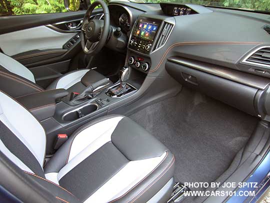 2018 Subaru Crosstrek Limited, gloss black shift plate, silver dash trim, climate control,  8" audio, dark and light gray leather interior, orange stitching