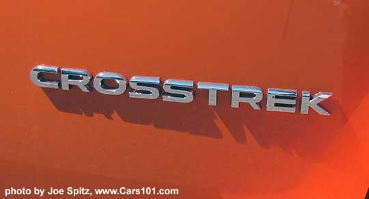 2018 Subaru Crosstrek rear gate logo, sunshine orange shown