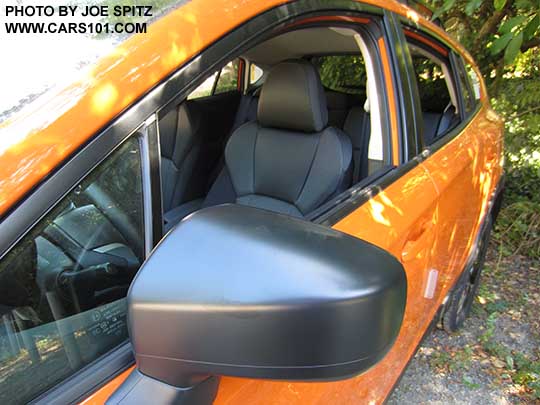 2018 Subaru Crosstrek 2.0i unpainted black outside mirrors. Sunshine orange shown.